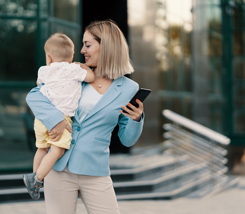 portrait-successful-business-woman-blue-suit-with-baby.jpg portrait-successful-business-woman-blue-suit-with-baby.jpg