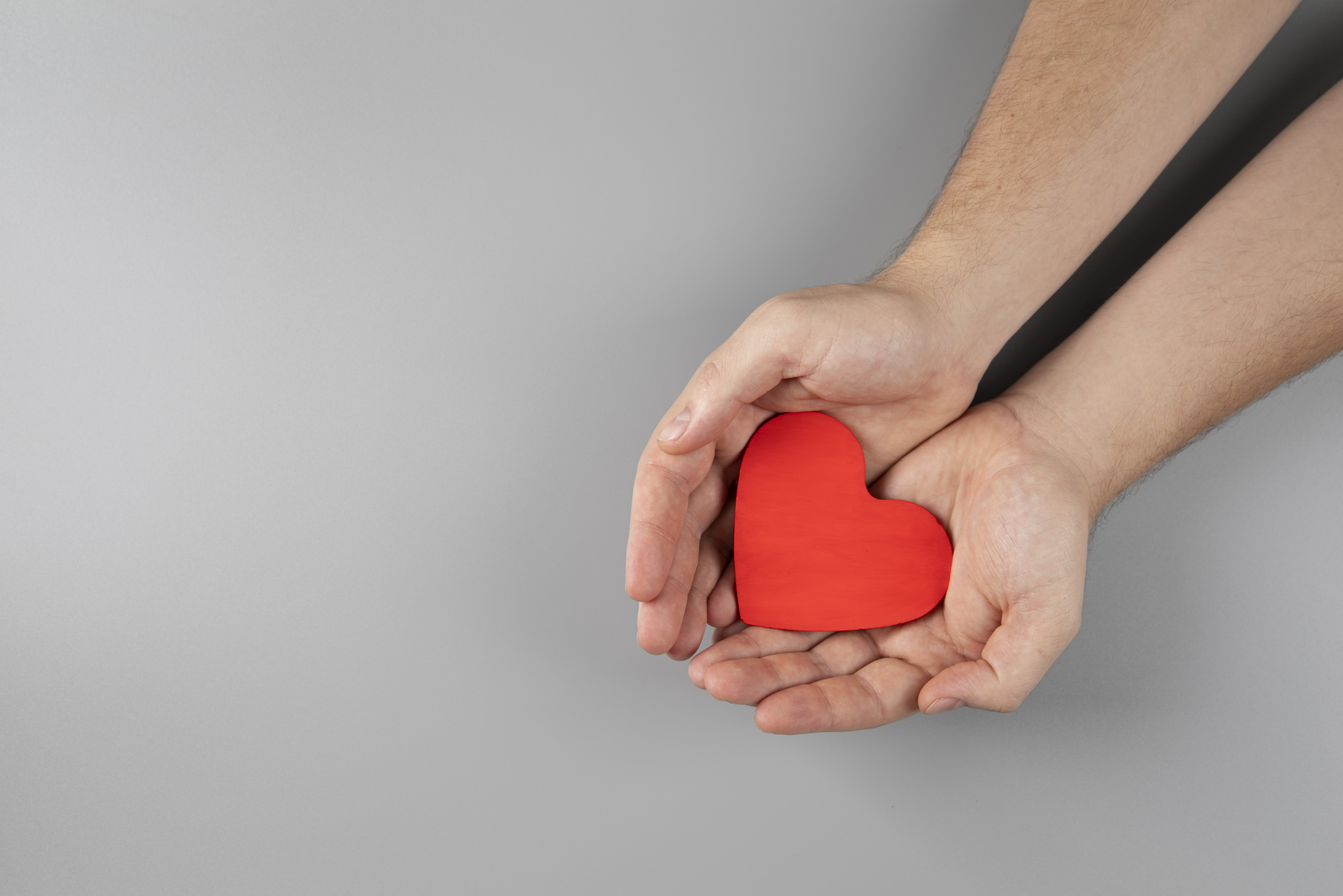 close-up-hands-holding-heart.jpg