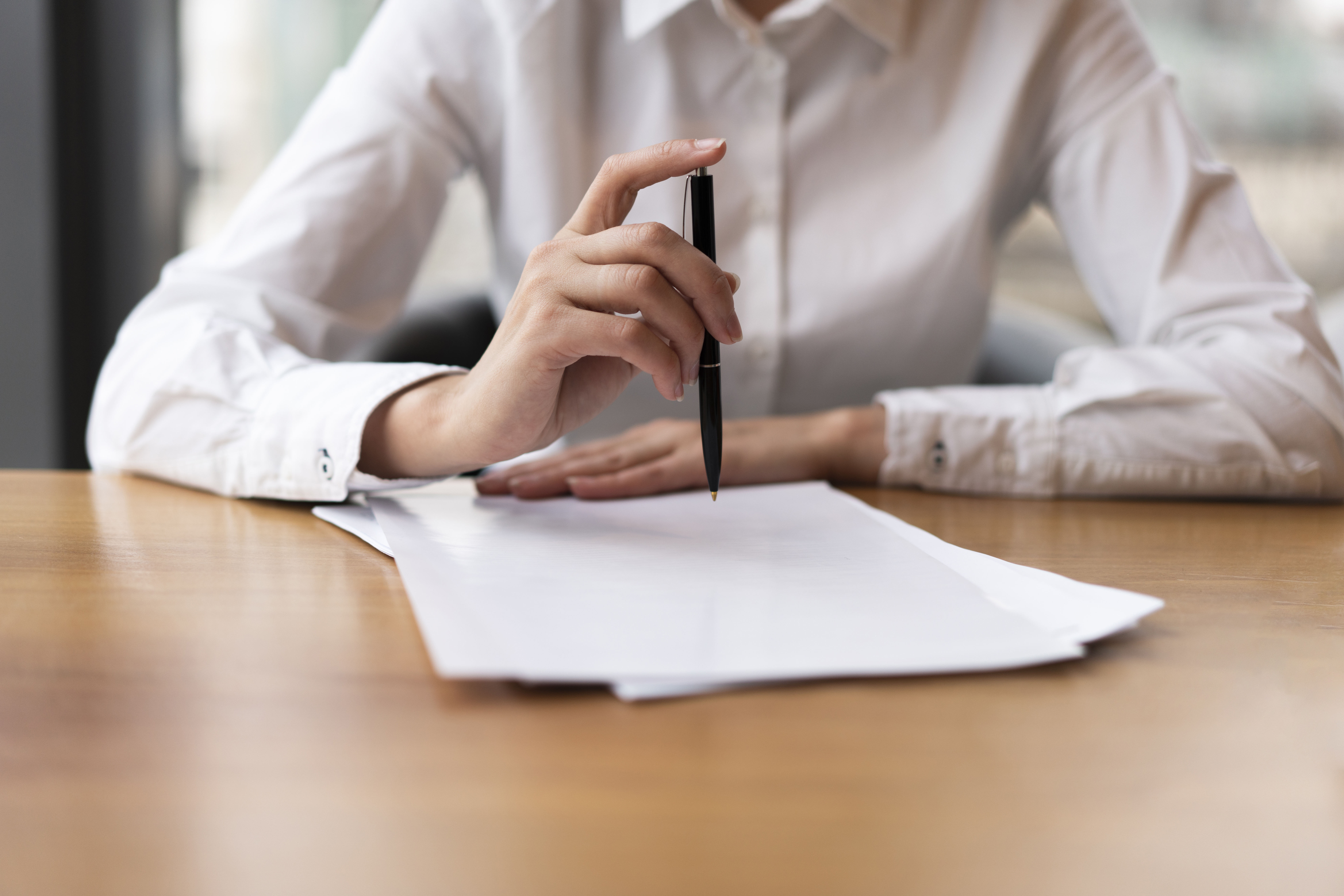 front-view-business-woman-clicking-pen.jpg front-view-business-woman-clicking-pen.jpg