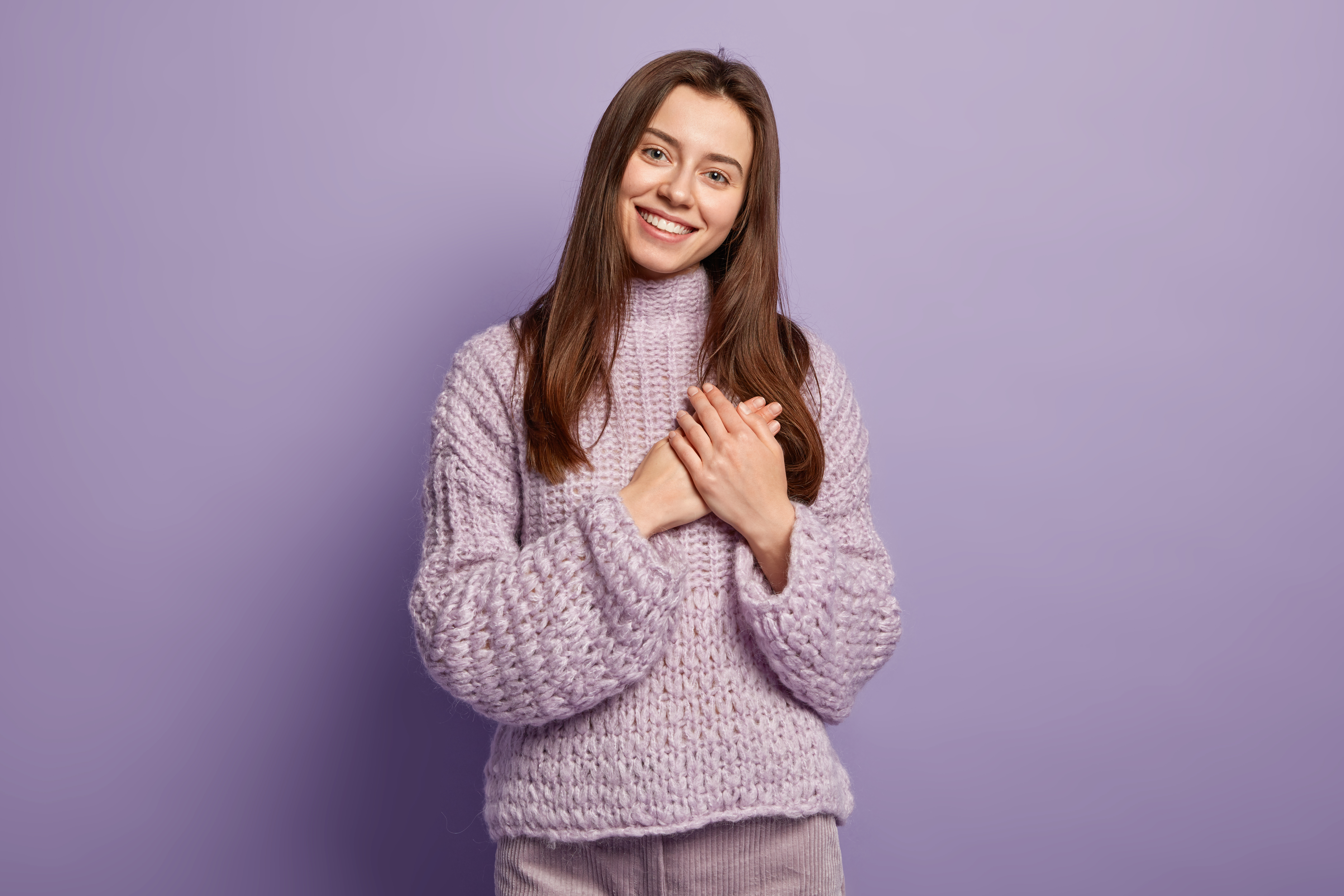 portrait-happy-young-european-woman-keeps-hands-breast-shows-heart-gesture-expresses-gratitude-being-thankful-models-against-purple-wall-body-language-monochrome-people-devotion.jpg portrait-happy-young-european-woman-keeps-hands-breast-shows-heart-gesture-expresses-gratitude-being-thankful-models-against-purple-wall-body-language-monochrome-people-devotion.jpg