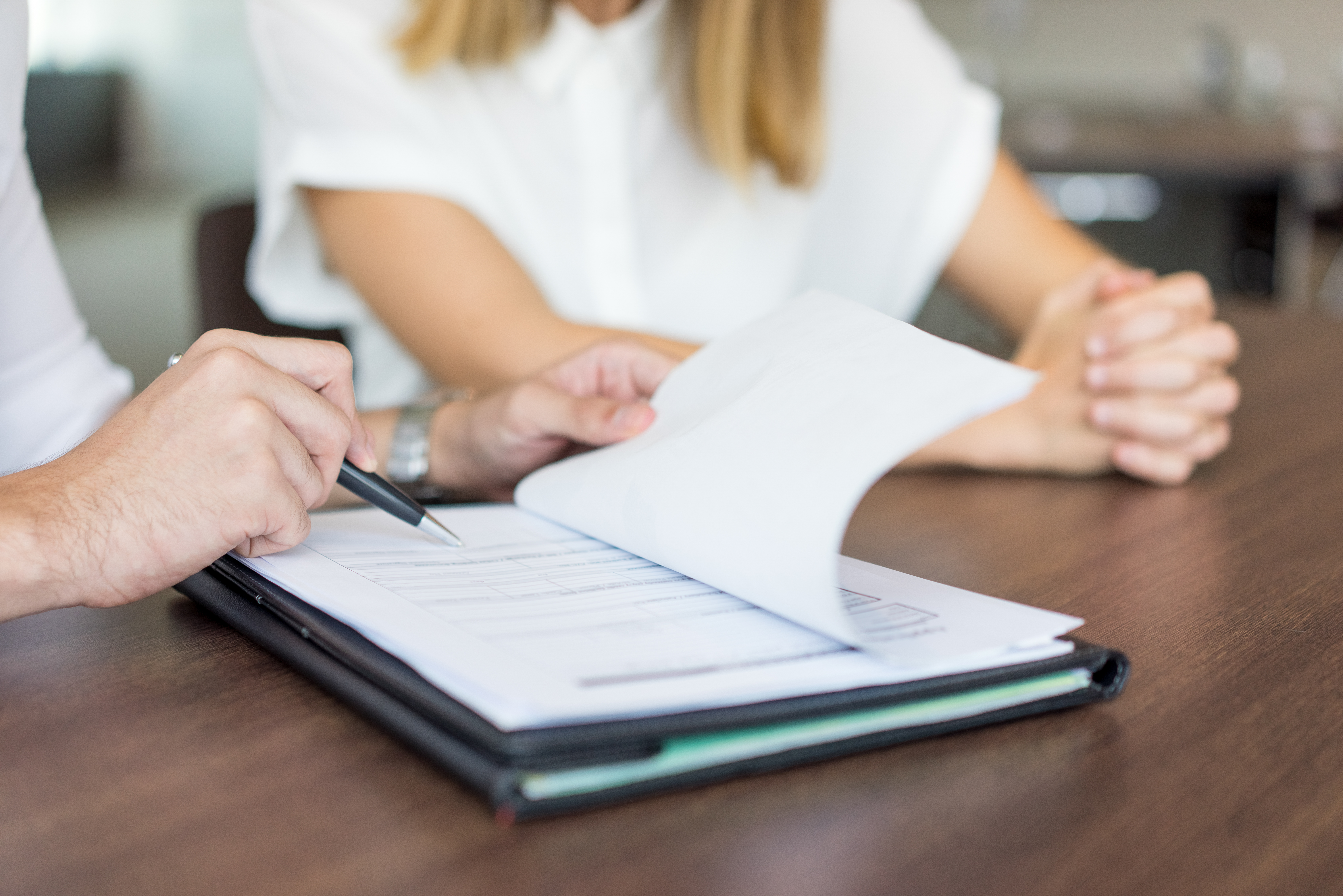hands-of-male-executive-showing-contract-to-female-partner-at-meeting.jpg hands-of-male-executive-showing-contract-to-female-partner-at-meeting.jpg