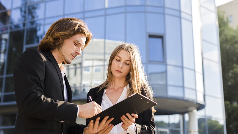 businessman-signing-clipboard.jpg businessman-signing-clipboard.jpg