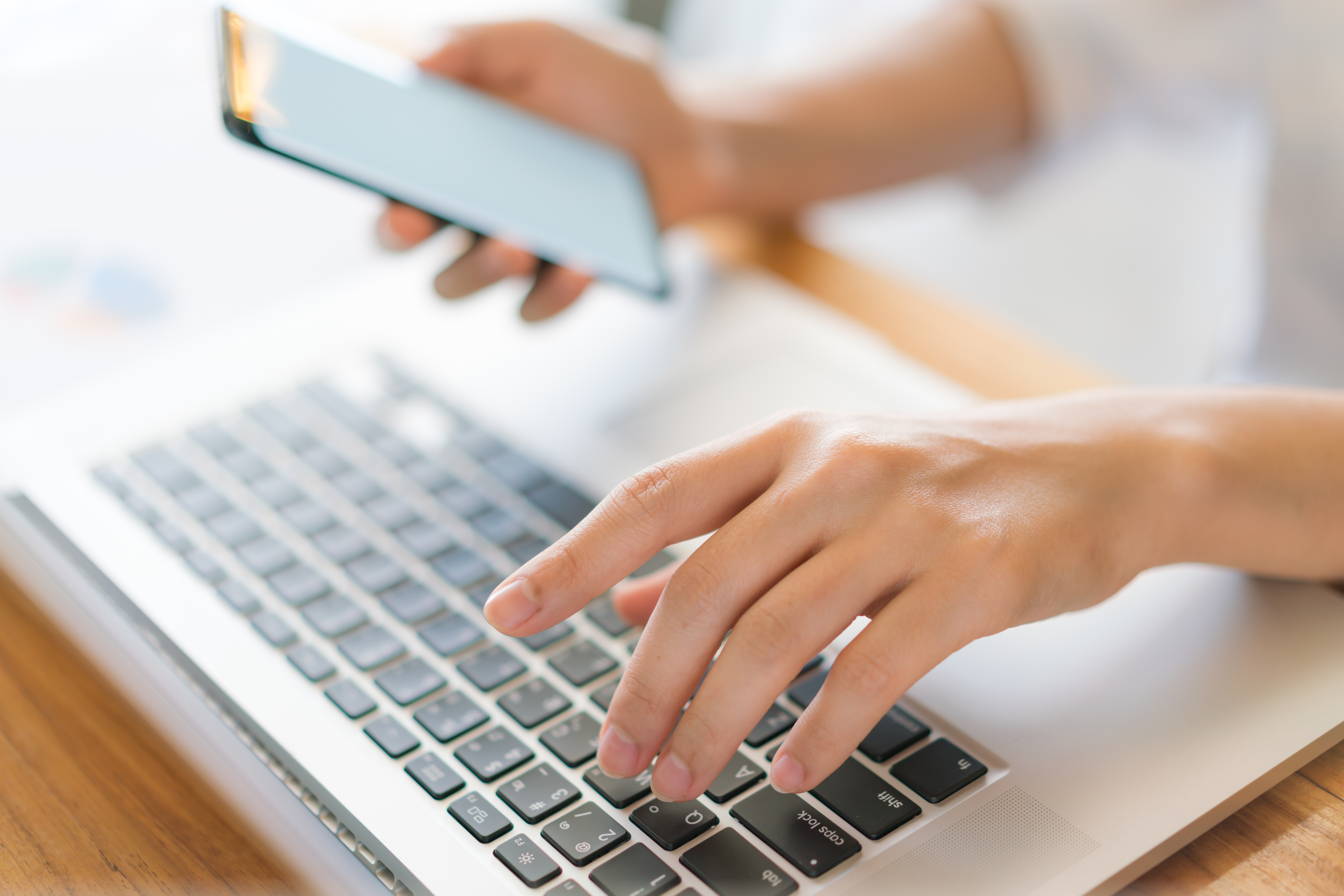 business-woman-hand-with-financial-charts-mobile-phone-laptop-table.jpg business-woman-hand-with-financial-charts-mobile-phone-laptop-table.jpg