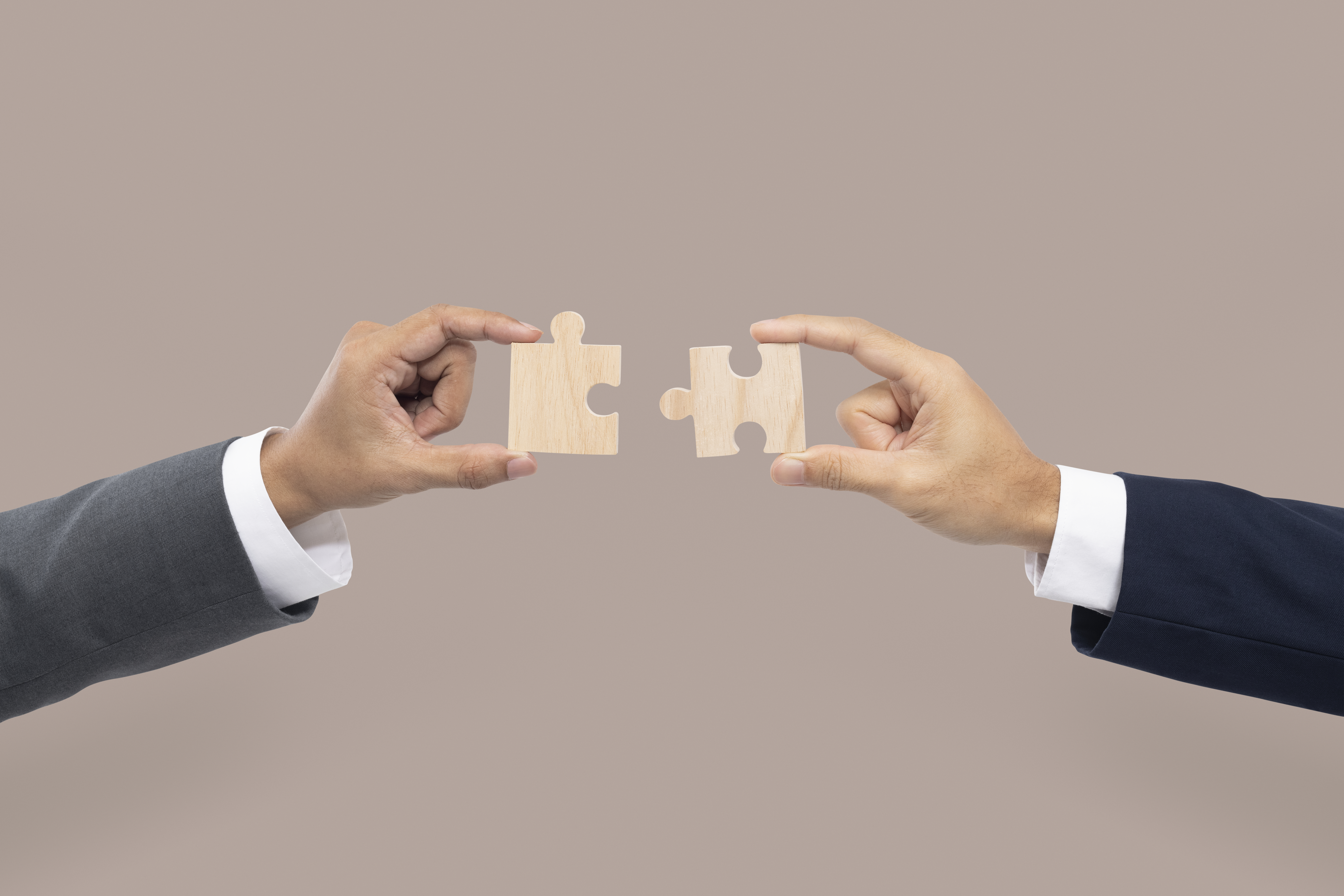 hands-holding-puzzle-business-problem-solving-concept.jpg